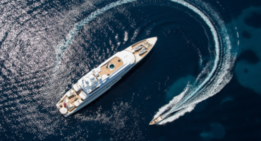 A millionaire and billionaire boat in the pacific ocean.